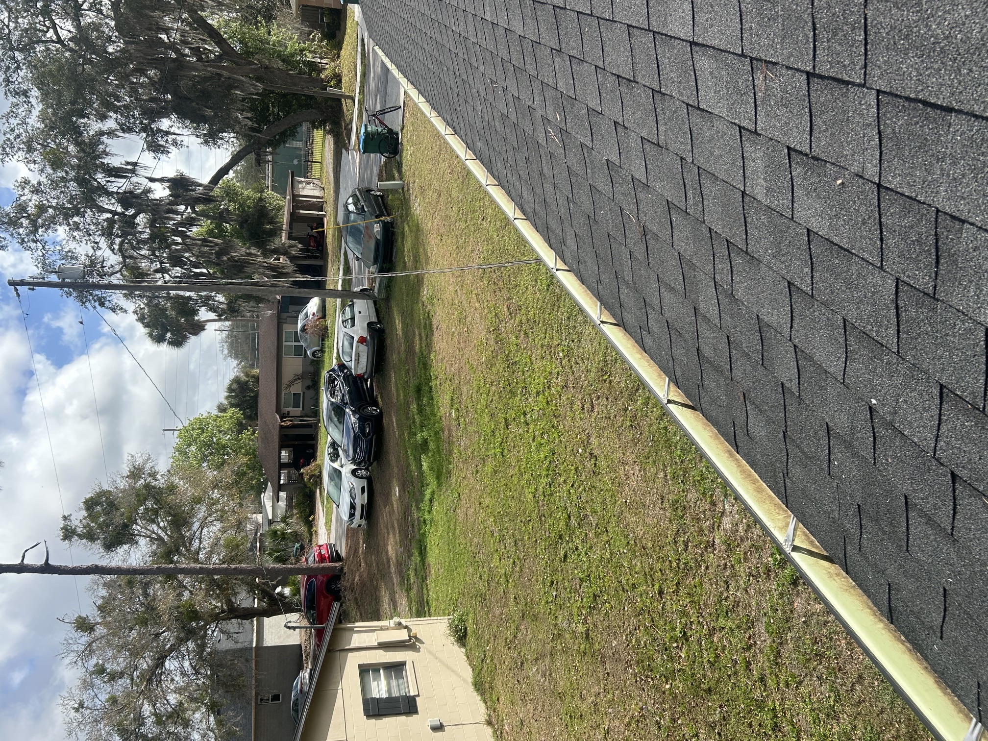 After: a clear, free-flowing gutter run along the roofline